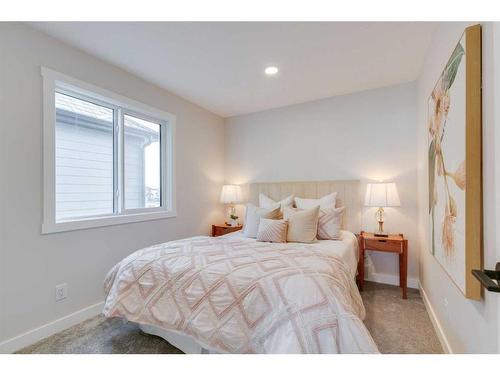 584 Grayling Bend, Rural Rocky View County, AB - Indoor Photo Showing Bedroom