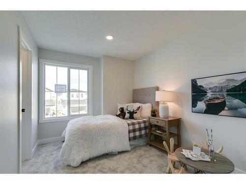 584 Grayling Bend, Rural Rocky View County, AB - Indoor Photo Showing Bedroom