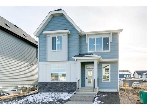 584 Grayling Bend, Rural Rocky View County, AB - Outdoor With Facade