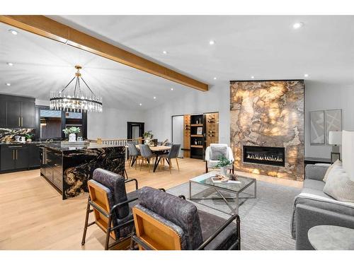 3604 Chippendale Drive Nw, Calgary, AB - Indoor Photo Showing Living Room With Fireplace