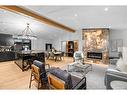 3604 Chippendale Drive Nw, Calgary, AB  - Indoor Photo Showing Living Room With Fireplace 