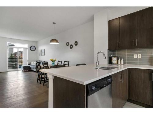 43 Walden Path Se, Calgary, AB - Indoor Photo Showing Kitchen With Double Sink