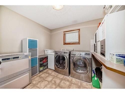 81 Springborough Boulevard Sw, Calgary, AB - Indoor Photo Showing Laundry Room