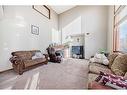 81 Springborough Boulevard Sw, Calgary, AB  - Indoor Photo Showing Living Room 