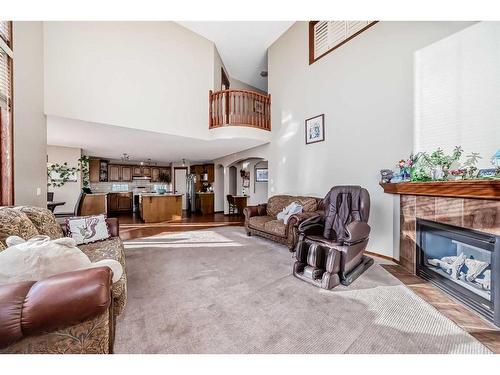 81 Springborough Boulevard Sw, Calgary, AB - Indoor Photo Showing Living Room With Fireplace