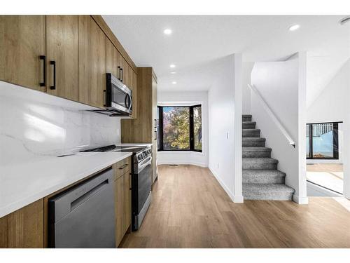 68 Hawkville Place Nw, Calgary, AB - Indoor Photo Showing Kitchen With Upgraded Kitchen