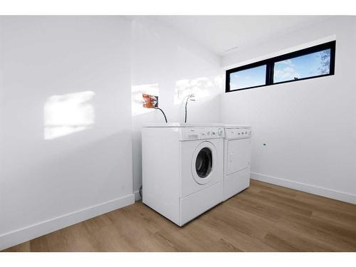 68 Hawkville Place Nw, Calgary, AB - Indoor Photo Showing Laundry Room