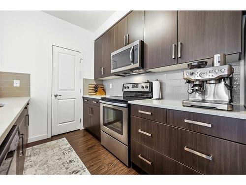 109-200 Cranfield Common Se, Calgary, AB - Indoor Photo Showing Kitchen