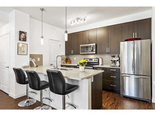 109-200 Cranfield Common Se, Calgary, AB - Indoor Photo Showing Kitchen With Upgraded Kitchen