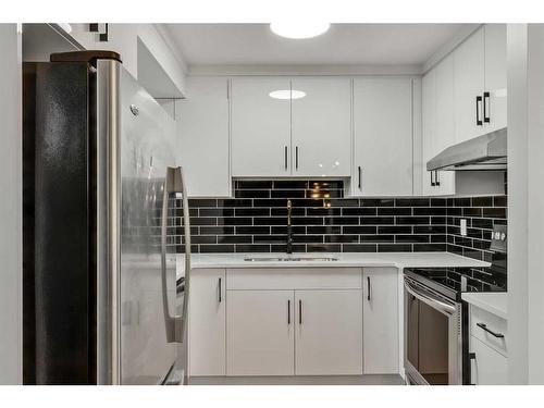 112-2720 Rundleson Road Ne, Calgary, AB - Indoor Photo Showing Kitchen With Upgraded Kitchen