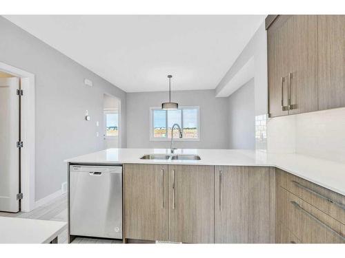 588 Dawson Drive, Chestermere, AB - Indoor Photo Showing Kitchen With Double Sink