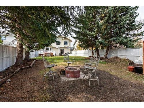 88 Woodmark Crescent Sw, Calgary, AB - Outdoor With Backyard