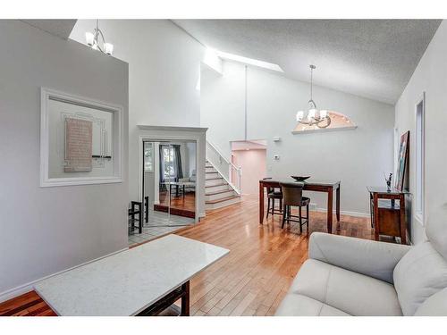 88 Woodmark Crescent Sw, Calgary, AB - Indoor Photo Showing Living Room