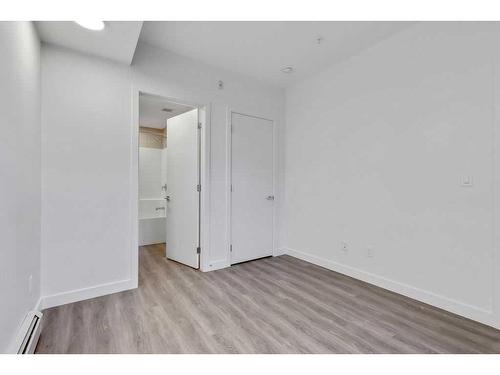 2113-350 Livingston Common Ne, Calgary, AB - Indoor Photo Showing Other Room