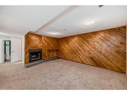 56 Bedford Circle Ne, Calgary, AB - Indoor With Fireplace