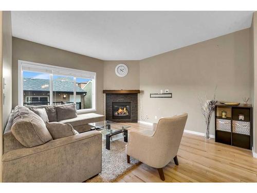 187 Evansridge Circle Nw, Calgary, AB - Indoor Photo Showing Living Room With Fireplace