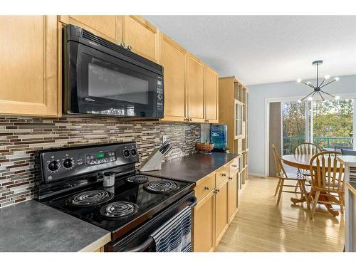 292 Evansbrooke Way Nw, Calgary, AB - Indoor Photo Showing Kitchen