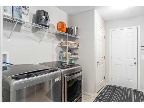 292 Evansbrooke Way Nw, Calgary, AB - Indoor Photo Showing Laundry Room