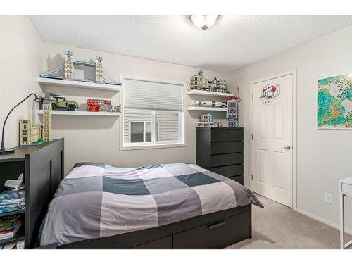 292 Evansbrooke Way Nw, Calgary, AB - Indoor Photo Showing Bedroom