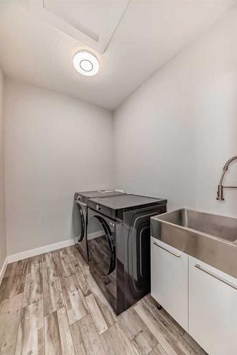 2021 17 Avenue Nw, Calgary, AB - Indoor Photo Showing Laundry Room