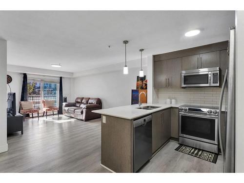 2113-302 Skyview Ranch Drive Ne, Calgary, AB - Indoor Photo Showing Kitchen With Stainless Steel Kitchen With Double Sink With Upgraded Kitchen