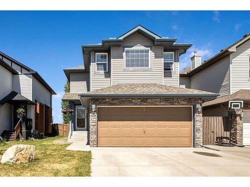 145 Crystal Shores Grove, Okotoks, AB - Outdoor With Facade