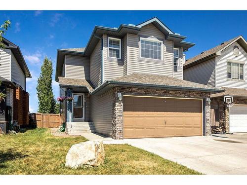 145 Crystal Shores Grove, Okotoks, AB - Outdoor With Facade