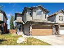 145 Crystal Shores Grove, Okotoks, AB  - Outdoor With Facade 