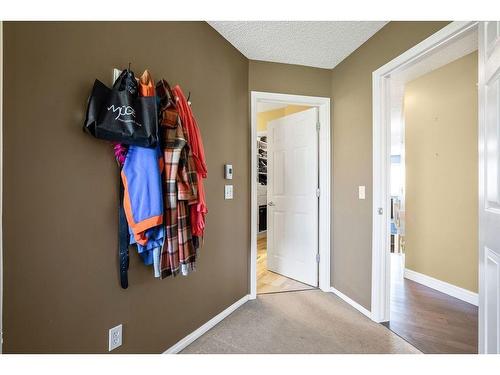 145 Crystal Shores Grove, Okotoks, AB - Indoor Photo Showing Other Room