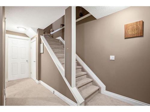 145 Crystal Shores Grove, Okotoks, AB - Indoor Photo Showing Other Room