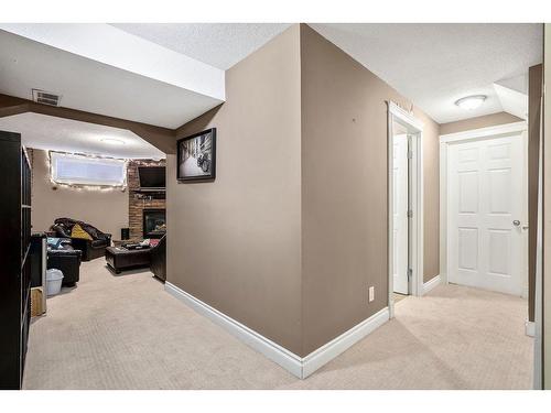 145 Crystal Shores Grove, Okotoks, AB - Indoor Photo Showing Other Room