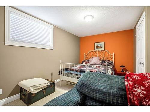 145 Crystal Shores Grove, Okotoks, AB - Indoor Photo Showing Bedroom