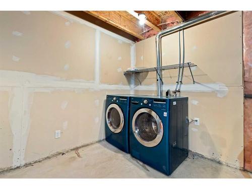 46 Elgin Meadows Gardens Se, Calgary, AB - Indoor Photo Showing Laundry Room