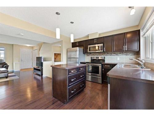 46 Elgin Meadows Gardens Se, Calgary, AB - Indoor Photo Showing Kitchen With Stainless Steel Kitchen With Double Sink With Upgraded Kitchen