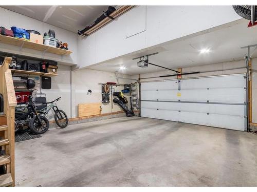 93 Brightonwoods Gardens Se, Calgary, AB - Indoor Photo Showing Garage