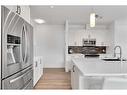 2 Sage Bluff Heights Nw, Calgary, AB  - Indoor Photo Showing Kitchen With Stainless Steel Kitchen With Upgraded Kitchen 