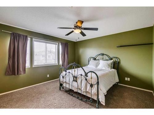 43 Bridlecrest Road Sw, Calgary, AB - Indoor Photo Showing Bedroom