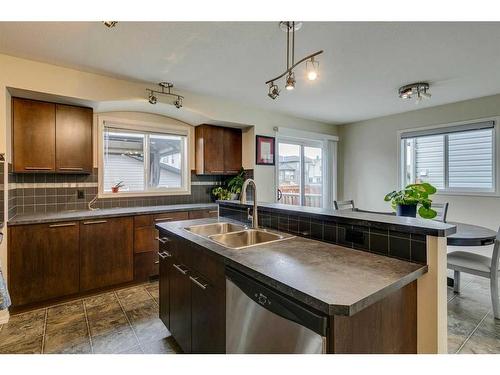 43 Bridlecrest Road Sw, Calgary, AB - Indoor Photo Showing Kitchen With Double Sink