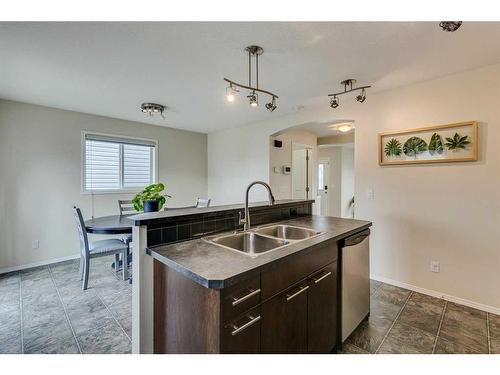 43 Bridlecrest Road Sw, Calgary, AB - Indoor Photo Showing Kitchen With Double Sink