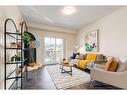 3314-99 Copperstone Park Se, Calgary, AB  - Indoor Photo Showing Living Room 