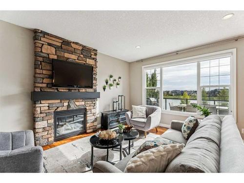 122 Canals Close Sw, Airdrie, AB - Indoor Photo Showing Living Room With Fireplace