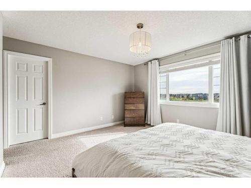 122 Canals Close Sw, Airdrie, AB - Indoor Photo Showing Bedroom