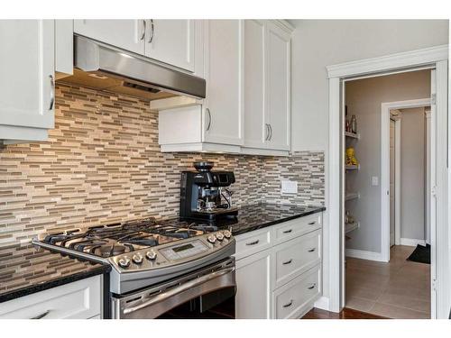 122 Canals Close Sw, Airdrie, AB - Indoor Photo Showing Kitchen With Upgraded Kitchen