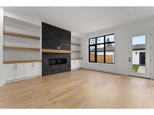 2634 30 Street Sw, Calgary, AB - Indoor Photo Showing Living Room With Fireplace