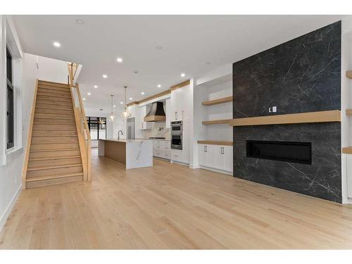 2634 30 Street Sw, Calgary, AB - Indoor Photo Showing Living Room With Fireplace