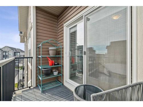 1005-250 Fireside View, Cochrane, AB - Outdoor With Balcony With Exterior