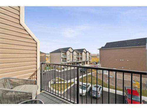 1005-250 Fireside View, Cochrane, AB - Outdoor With Balcony With Exterior