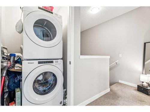 1005-250 Fireside View, Cochrane, AB - Indoor Photo Showing Laundry Room