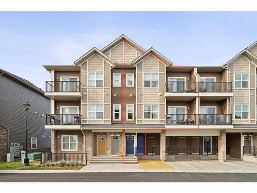 1005-250 Fireside View, Cochrane, AB - Outdoor With Balcony With Facade