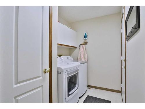 223 Hamptons Park Nw, Calgary, AB - Indoor Photo Showing Laundry Room